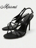 Square-Toe Thong Stiletto Sandals in black - front view